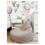 Pouf à pompon beige