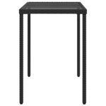 vidaXL Table de jardin dessus en verre noir 115x54x74cm résine tressée