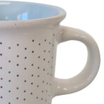 Tasse blanche et bleue en grès motif points