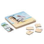 Sur la plage - le pélican pousse  31 pièces de puzzle