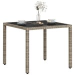 vidaXL Table de jardin avec dessus en verre gris clair résine tressée