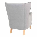 Fauteuil en velours gris clair avec pieds en bois naturel