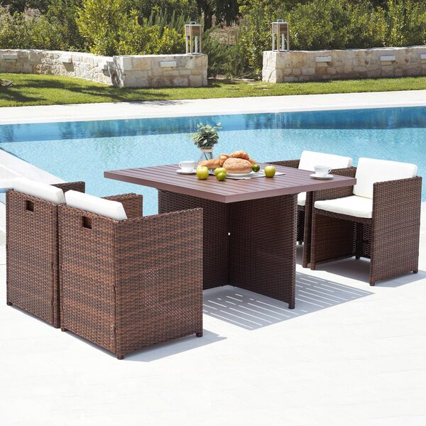 Le Kaolino : salon de jardin encastrable 4 places en résine tressée et aluminium marron coussins blancs