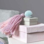 24 pompons en laine teintes pastel