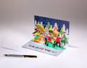 Carte pop'up fin d'année- Meilleurs vœux- Patineurs et bonhomme de neige dansant autour des sapins