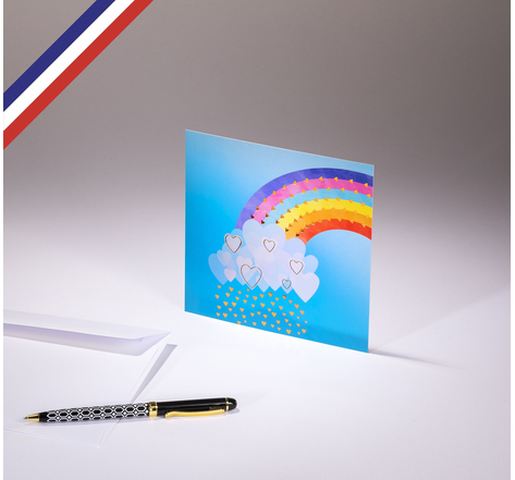 Carte simple All you need is love créée et imprimée en France sur papier certifié PEFC - Pluie de cœurs sous un arc-en-ciel