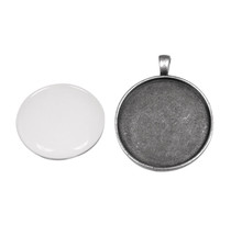 Médaillon pendentif en métal et cabochon rond ø37mm argenté
